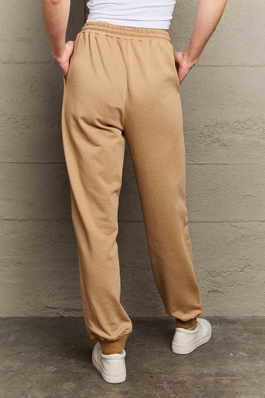 Full Size Drawstring Flower & Skull Graphic Long Sweatpants